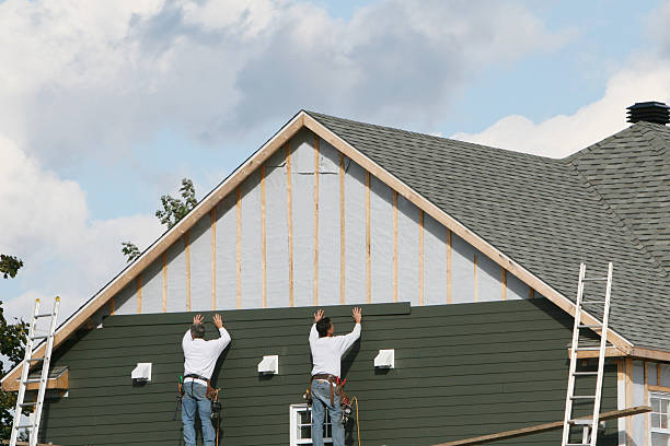 Professional Siding technician working in Garner, NC